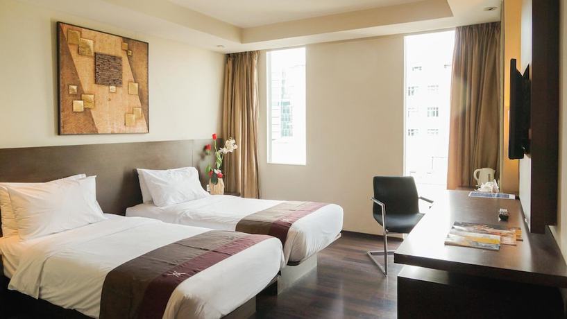 Imagen de la habitación del Hotel The Akmani Jakarta. Foto 3