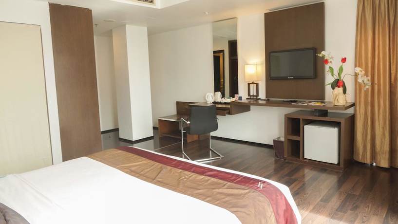 Imagen de la habitación del Hotel The Akmani Jakarta. Foto 8