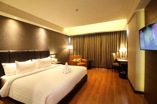 Imagen de la habitación del Hotel The Alana & Convention Center Solo. Foto 6
