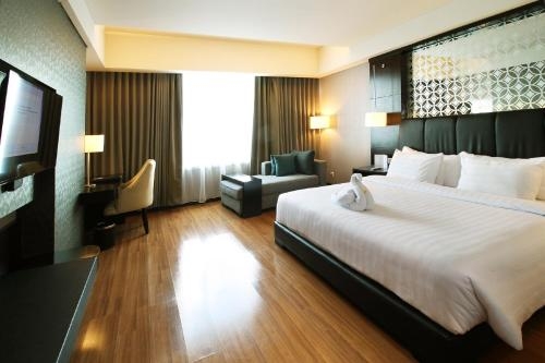 Imagen de la habitación del Hotel The Alana & Convention Center Solo. Foto 7
