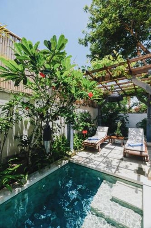 Imagen de la habitación del Hotel The Alantara Sanur. Foto 9