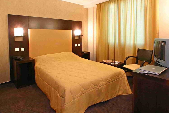 Imagen de la habitación del Hotel The Alassia. Foto 8