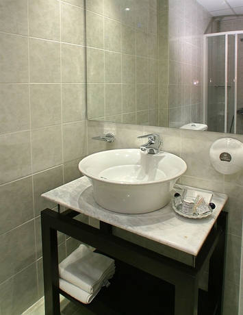 Imagen de la habitación del Hotel The Alassia. Foto 10