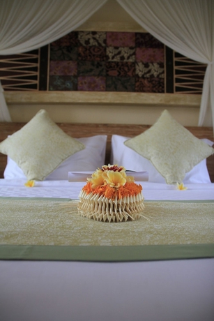 Imagen de la habitación del Hotel The Alena Resort A Pramana Experience. Foto 18