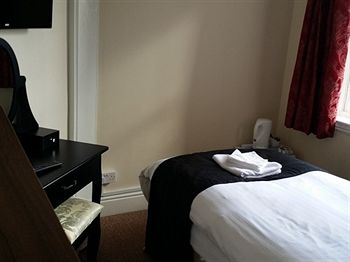 Imagen de la habitación del Hotel The Alexandra. Foto 4