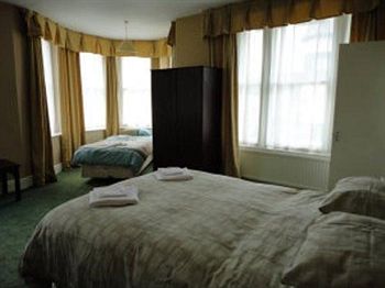 Imagen de la habitación del Hotel The Alexandra. Foto 6