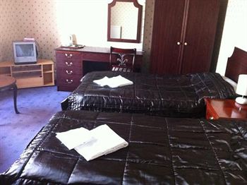 Imagen de la habitación del Hotel The Alexandra. Foto 8