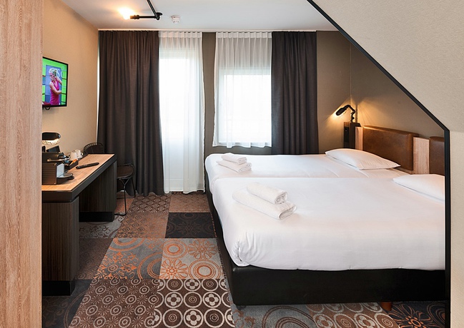 Imagen de la habitación del Hotel The Alfred. Foto 8