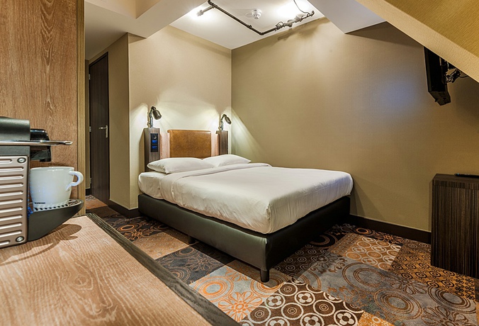 Imagen de la habitación del Hotel The Alfred. Foto 9