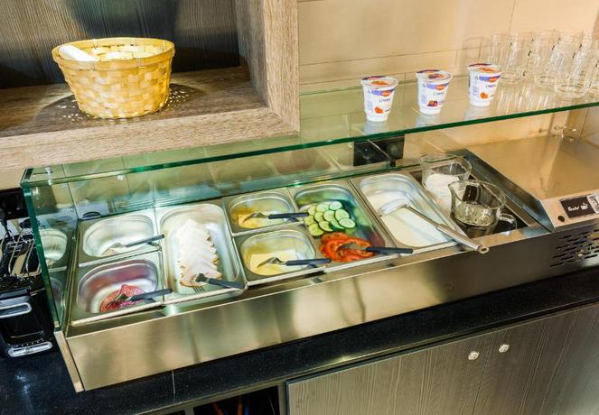 Imagen del bar/restaurante del Hotel The Alfred. Foto 2