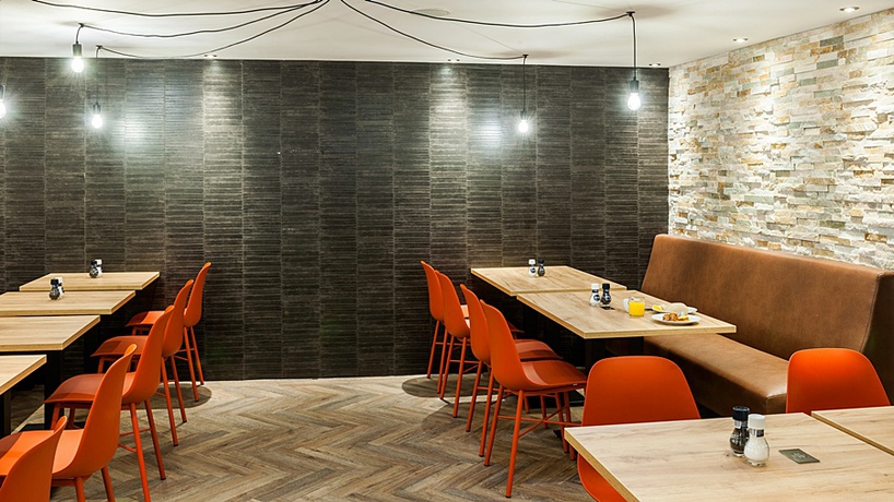 Imagen del bar/restaurante del Hotel The Alfred. Foto 4