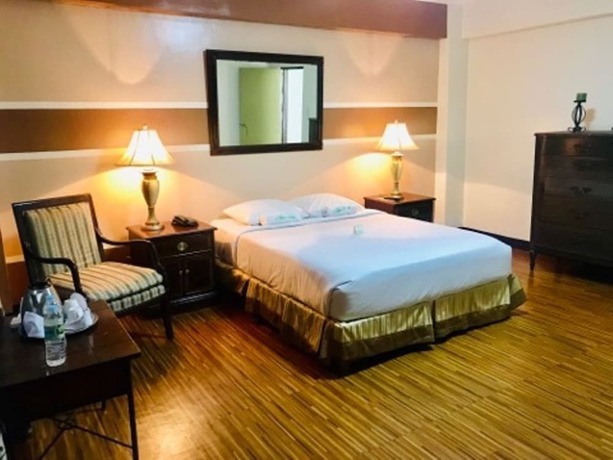 Imagen de la habitación del Hotel The Alpa and Restaurant. Foto 4