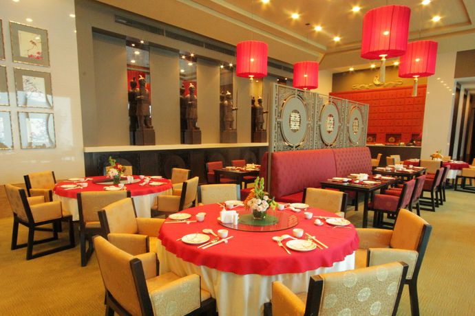 Imagen del bar/restaurante del Hotel The Alpha Suites. Foto 2