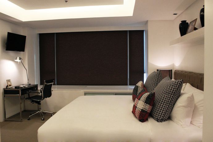 Imagen de la habitación del Hotel The Alpha Suites. Foto 17