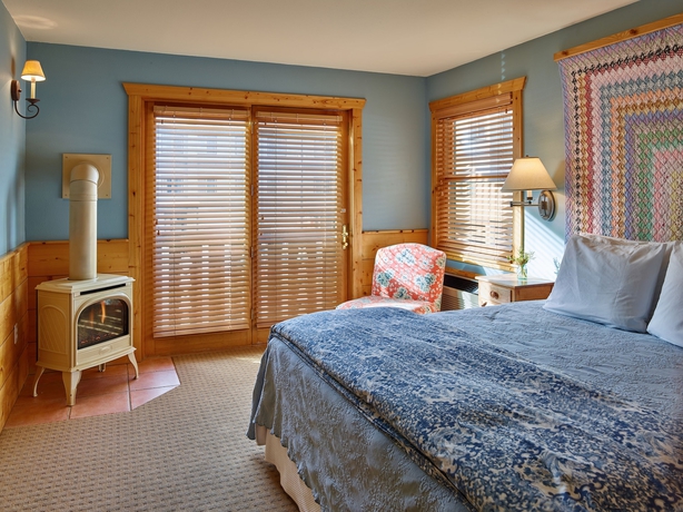 Imagen de la habitación del Hotel The Alpine House. Foto 3