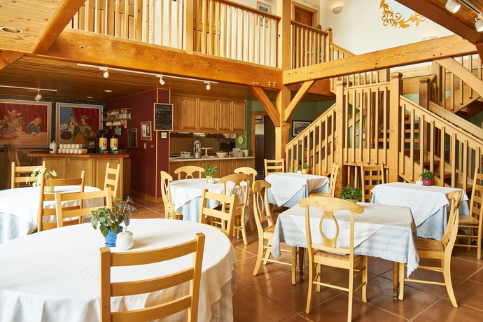 Imagen del bar/restaurante del Hotel The Alpine House. Foto 2