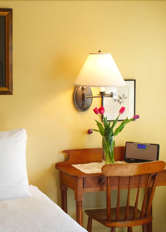 Imagen de la habitación del Hotel The Alpine House. Foto 16