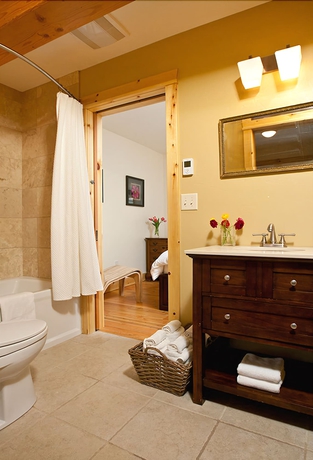 Imagen de la habitación del Hotel The Alpine House. Foto 18