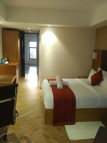 Imagen de la habitación del Hotel The Alps. Foto 9