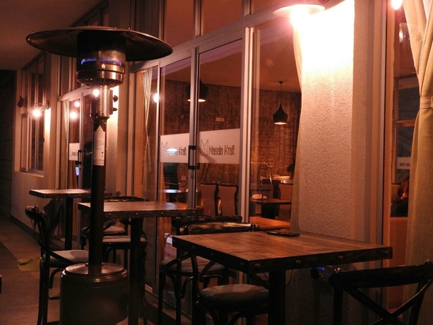 Imagen del bar/restaurante del Hotel The Alps. Foto 7