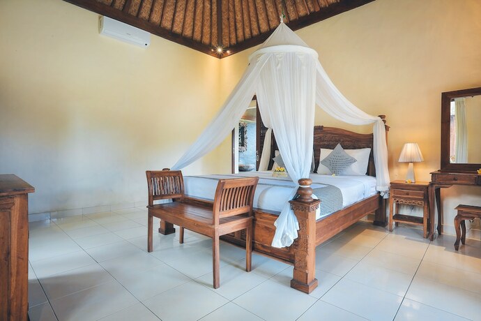 Imagen de la habitación del Hotel The Alus Cottages. Foto 5