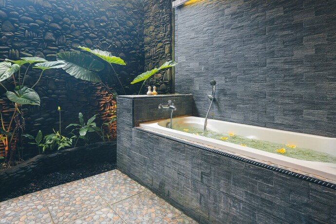 Imagen de la habitación del Hotel The Alus Cottages. Foto 6