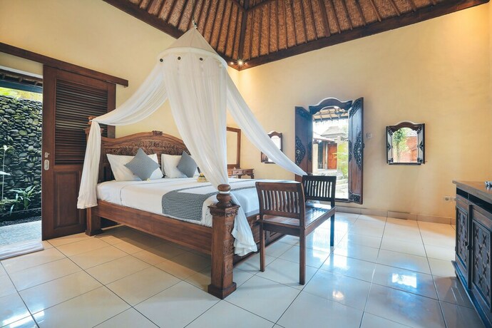 Imagen de la habitación del Hotel The Alus Cottages. Foto 10