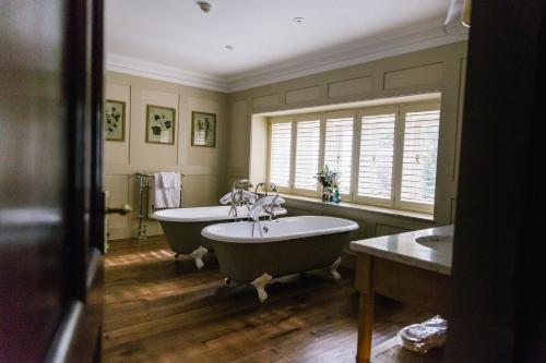 Imagen de la habitación del Hotel The Alverton. Foto 8