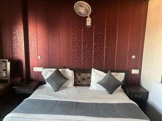 Imagen de la habitación del Hotel The Amar Grand. Foto 2