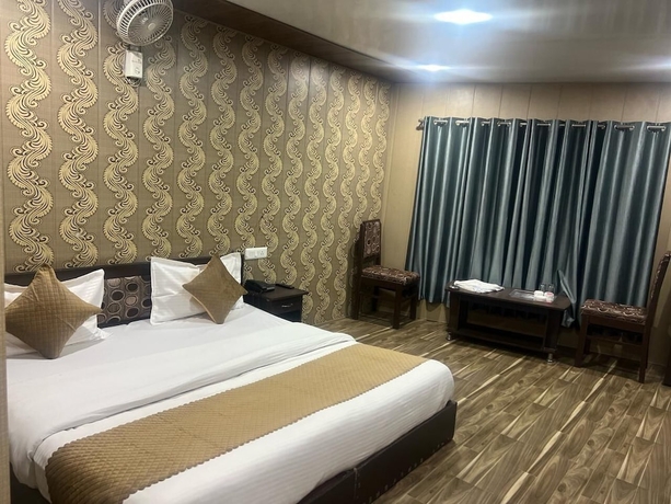 Imagen de la habitación del Hotel The Amar Grand. Foto 6