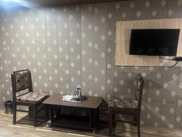 Imagen de la habitación del Hotel The Amar Grand. Foto 7