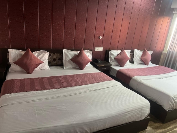 Imagen de la habitación del Hotel The Amar Grand. Foto 8