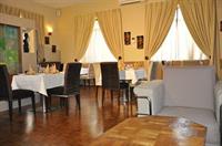 Imagen del bar/restaurante del Hotel The Amariah Boutique Mikocheni. Foto 3