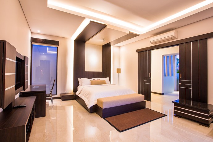 Imagen de la habitación del Hotel The Amarta Villa. Foto 9