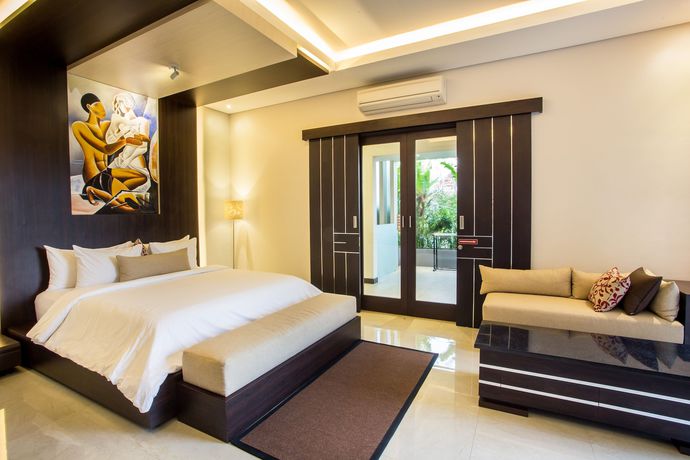 Imagen de la habitación del Hotel The Amarta Villa. Foto 13