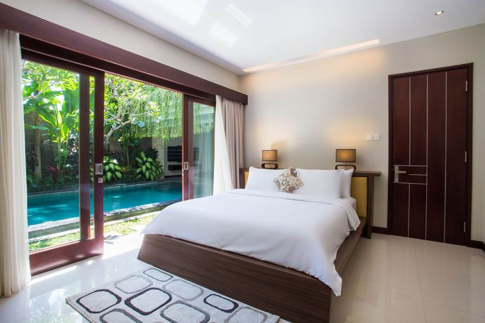 Imagen de la habitación del Hotel The Amarta Villa. Foto 19