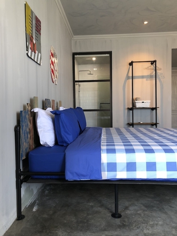 Imagen de la habitación del Hotel The Amartya. Foto 13