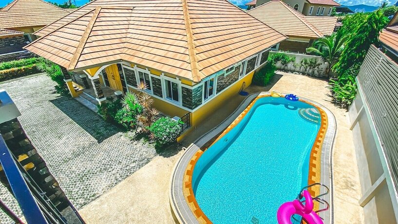 Imagen de la habitación del Hotel The Amazia Pool Villa. Foto 15