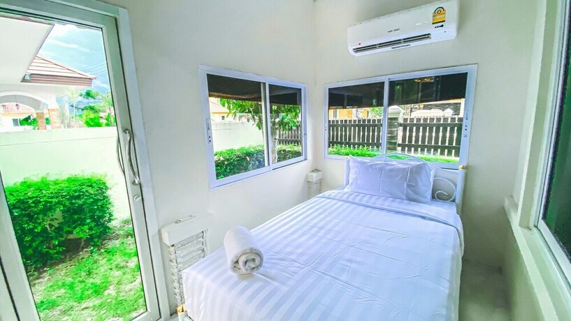 Imagen de la habitación del Hotel The Amazia Pool Villa. Foto 21