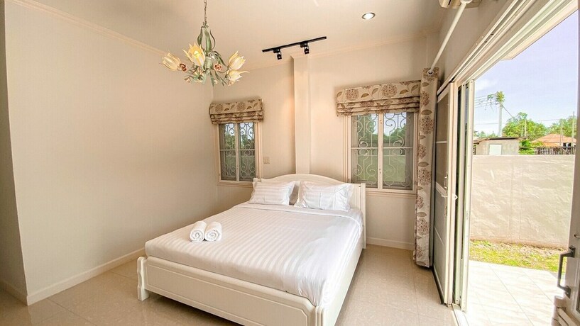 Imagen de la habitación del Hotel The Amazia Pool Villa. Foto 30