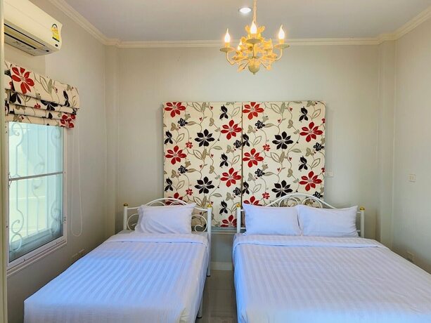 Imagen de la habitación del Hotel The Amazia Pool Villa. Foto 32