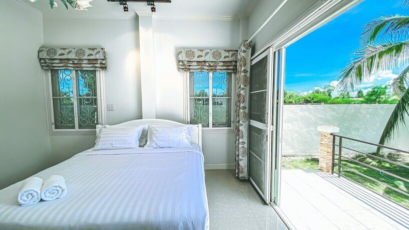 Imagen de la habitación del Hotel The Amazia Pool Villa. Foto 34