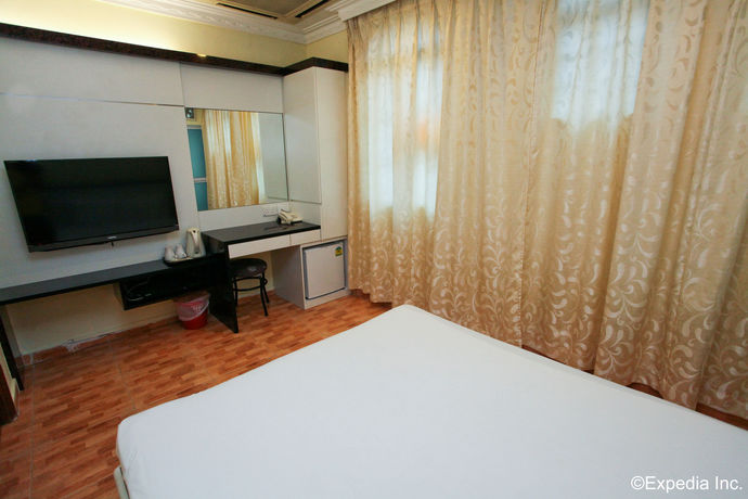 Imagen de la habitación del Hotel The Amazing Inn. Foto 8