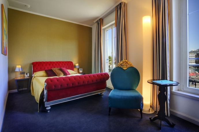 Imagen de la habitación del Hotel The Ambassador. Foto 10