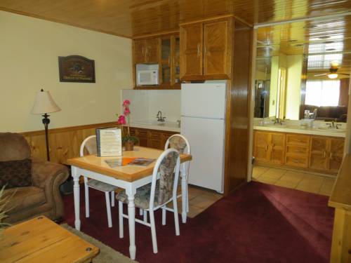 Imagen de la habitación del Hotel The Americana Village. Foto 13