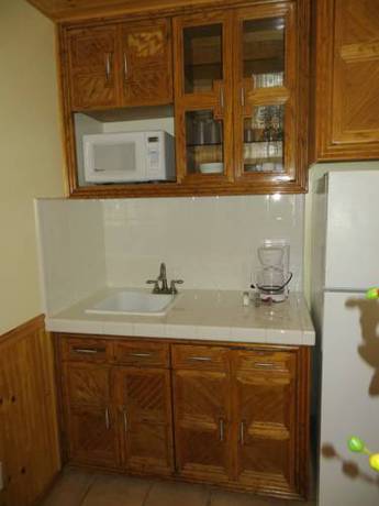 Imagen de la habitación del Hotel The Americana Village. Foto 15