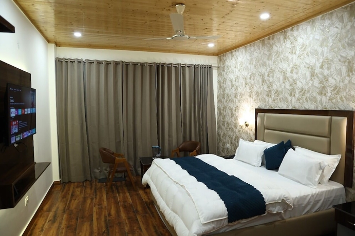 Imagen de la habitación del Hotel The Amore Hills. Foto 2