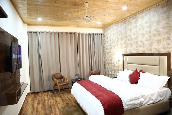 Imagen de la habitación del Hotel The Amore Hills. Foto 8