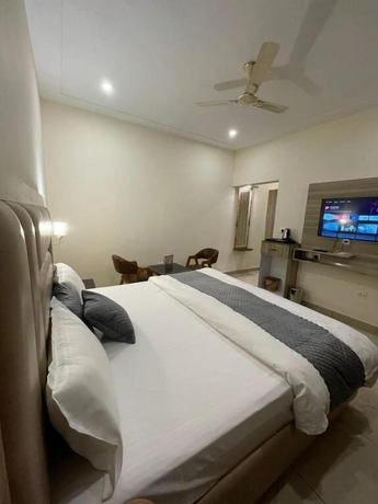 Imagen de la habitación del Hotel The Amore Hills. Foto 9