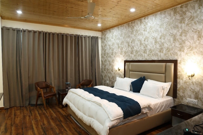 Imagen de la habitación del Hotel The Amore Hills. Foto 13